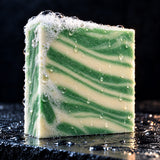 Close up of the Freshly Minted soap bar with fresh lather on wet slate