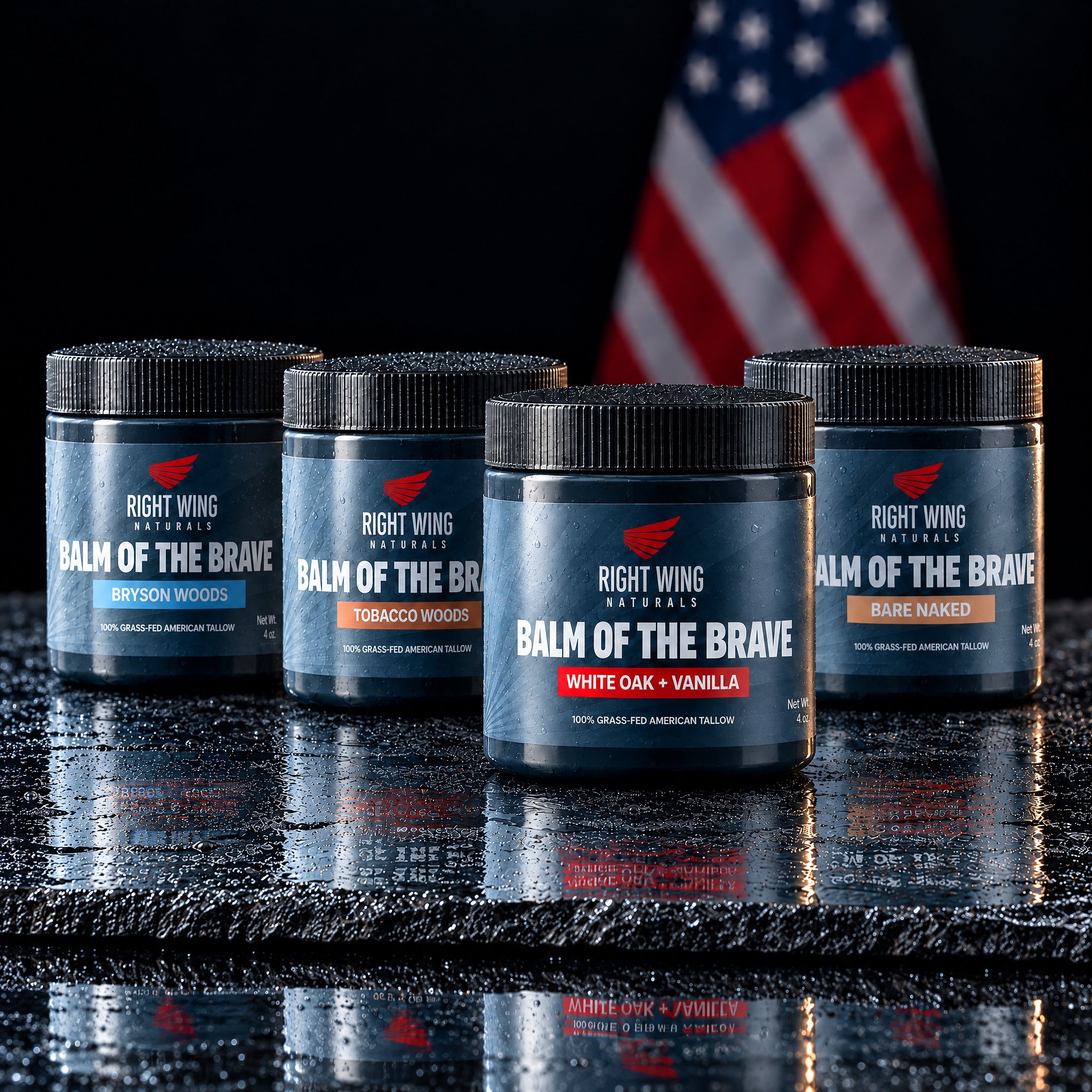 Balm of the Brave tallow balm, all four scents, on wet slate with an American flag behind