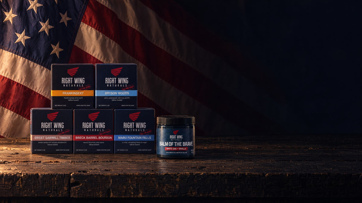 Five Right Wing Naturals tallow bars and a Balm of the Brave jar in front of an American flag
