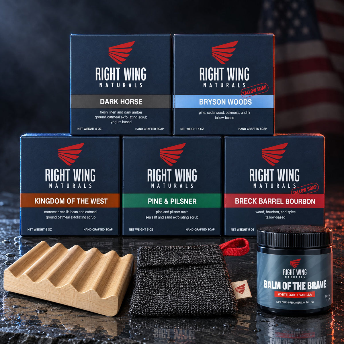 The Old Guard men's soap set with five boxed soap bars, a wooden soap dish, an exfoliating pouch and a jar of Balm of the Brave